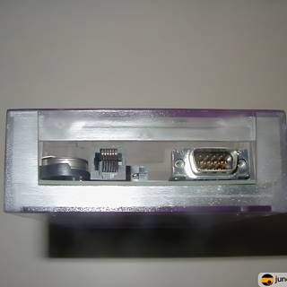 Vintage Cassette Player with Electrical Device in a Purple Box