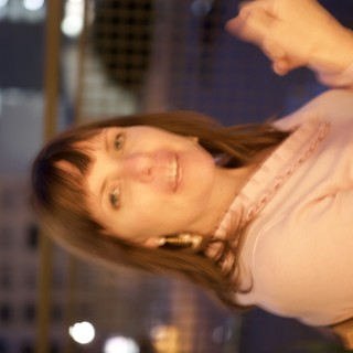 Penelope Smiling Softly at Sakura Crossing Night