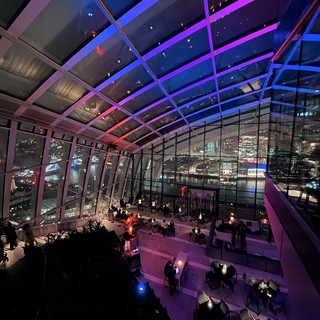 Modern Sky Garden Restaurant with Purple Ambient Lighting