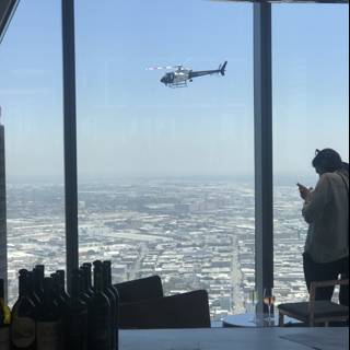 Helicopter Flying over a City
