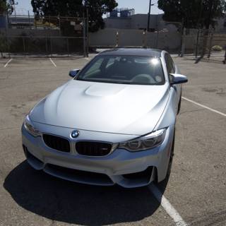 BMW M4 parked in a lot