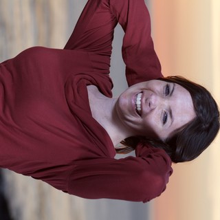 Joyful Woman at Sunset by the Sea