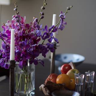 Elegant Purple Flower Arrangement with Candles