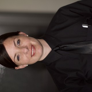 Professional Server Portrait in Black Uniform