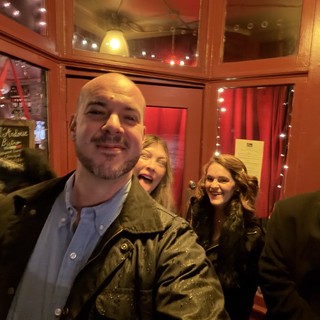 Friends Enjoying a Night Out at Restaurant
