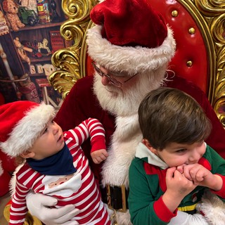 Children Visit Santa in His Ornate Golden Throne