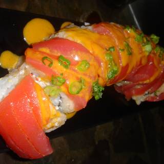 Towering Sushi Roll with Fresh Tomatoes and Green Onions