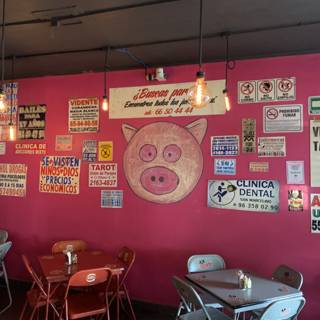 Pink Cafe with Colorful Signs