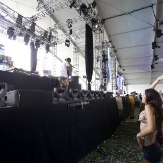 Coachella concertgoer dances on stage
