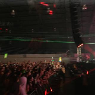 Green Lights and a Crowd at a Nightclub Concert in San Bernardino