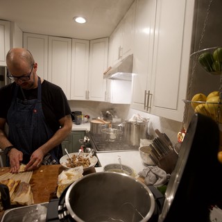 Chef Preparing Holiday Meal in Modern Kitchen