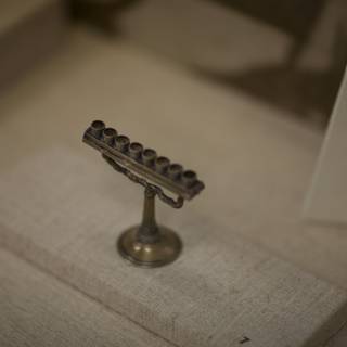 A Silver Menorah Glows in the Museum