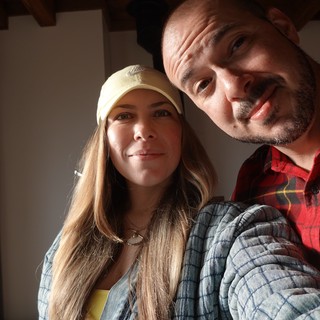 Happy Couple Taking Indoor Selfie Together