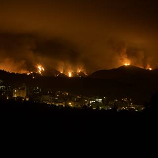 Flames Illuminate the City Skyline as Station Fire Rages in the Hills