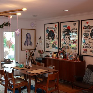 Mid-Century Modern Dining Room with Pop Art Posters