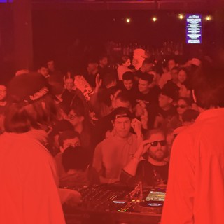 Skrillex and Four Tet Concert Crowd in Red Light