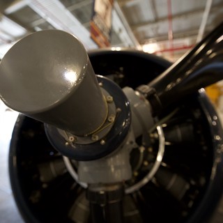 Close-Up of Vintage Aircraft Propeller Hub in Hangar