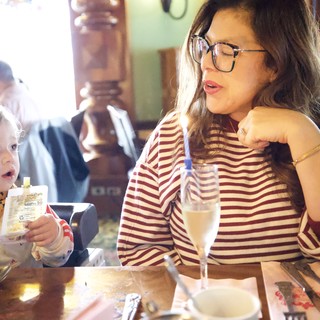Mother and Child Dining Together at Restaurant