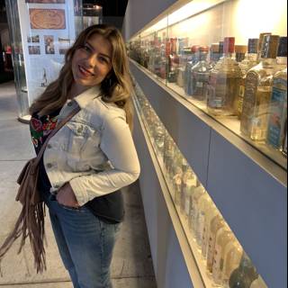 Girl in Jeans and Accessories Checking Out Beverages on Shelf