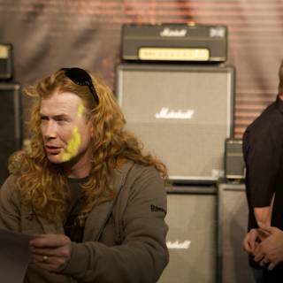 Dave Mustaine Performs with a Female Guitarist