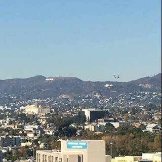 Hollywood Sign and Urban Skyline Captured from High Rise