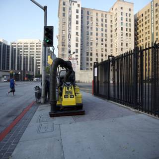 Construction Vehicle on the City Sidewalk