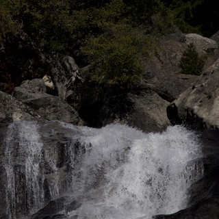 Rushing Cascade Through Granite Boulders in Yosemite