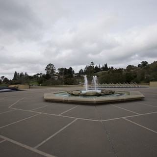 Fountain Plaza on Overcast Day with Distant Hills