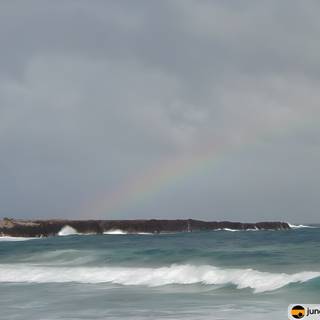 Spectacular Rainbow over the Majestic Hawaiian Ocean