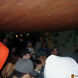 Nightclub Crowd with Hat-wearing Gentleman