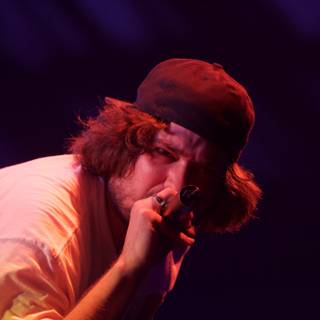 Cap-wearing Singer Takes Coachella Stage