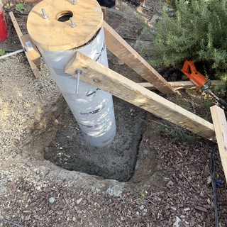 DIY Deck Post Foundation Construction in Progress