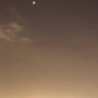 Lunar Eclipse over the Cityscape