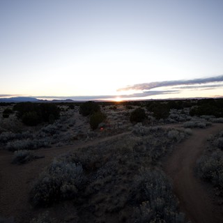Desert Sunset Over Sagebrush Trail in New Mexico