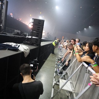 Front Row Fans Press Against Barrier at Wobbleland