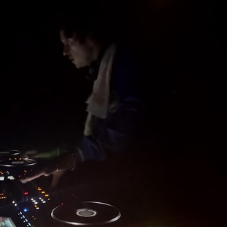 DJ Performing with Professional Pioneer Controller in London