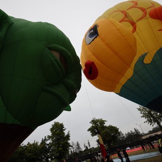 Giant Character Balloons Face Off at Festival