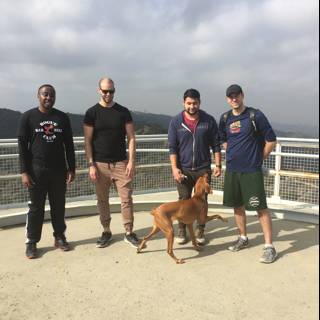 Four Men and a Canine Companion on a Santa Monica Bridge