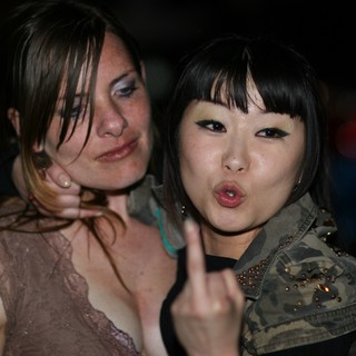 Two Women Posing at a Nightlife Event 2006