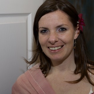 Smiling Bridesmaid With Flower in Her Hair