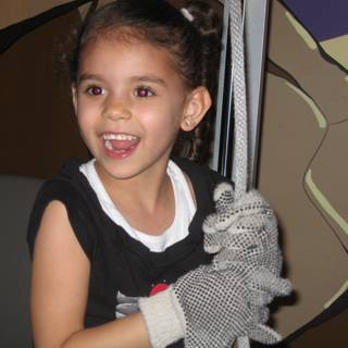 Little Girl and Her Baseball Glove