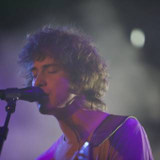Andrew VanWyngarden Rocks Coachella with His Signature Curls and Microphone