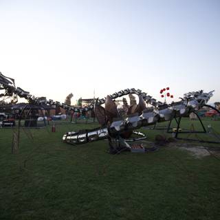 Dragon sculpture dominates grassy field