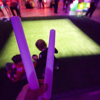 Purple Glow Sticks at Baby Rave Dance Event