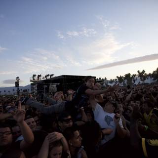 Man on Top of a Rocking Crowd