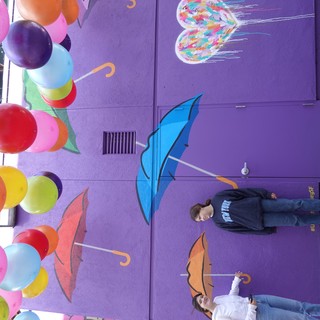 Colorful Balloon Installation with Umbrella Street Art