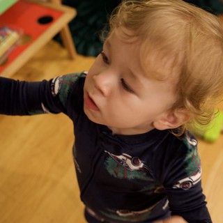 Joyful Toddler on Christmas Morning 2025