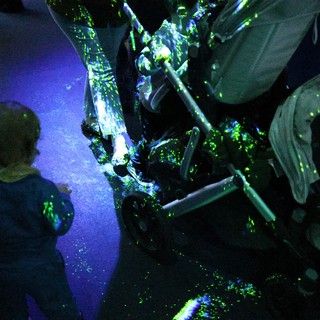 Dancing Under UV Light at Night Event
