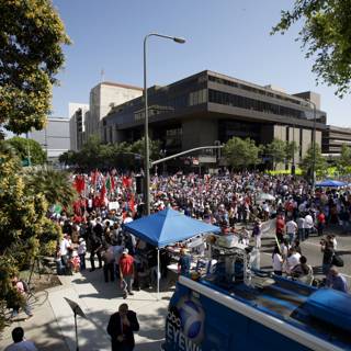 Mayday Rally Draws Massive Crowd in Front of Building
