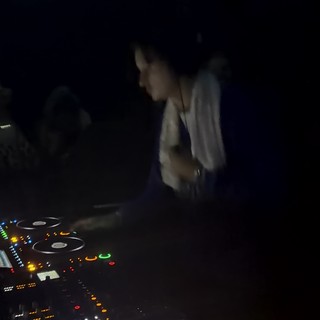 DJ Performance in Dark London Nightclub